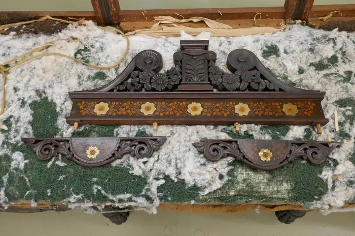 The inlaid wood and bronze detailing is incredible!