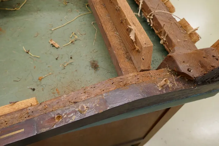 Most joints had been poorly "repaired" with improper dowels and excess glue. I cut them away and replaced them with new dowels.
