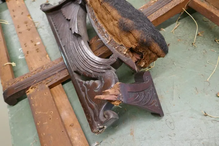 Serious damage to the arm was repaired with epoxy.