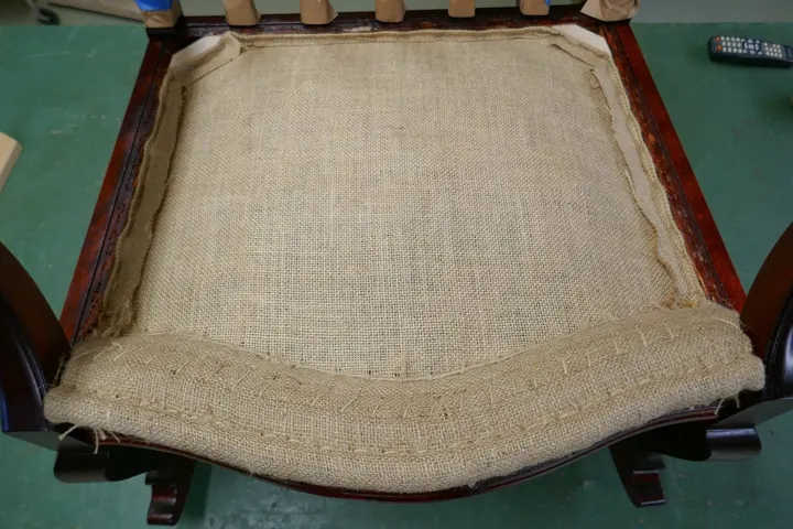 Three rows of stitching pull the edge into shape.