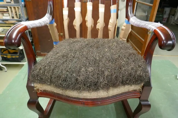 Although it wasn't part of the original padding, I used Spanish moss to even out low spots in the straw.