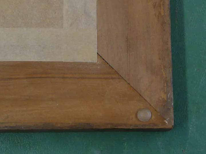 Plastic cabinet door bumps help protect wall paint.