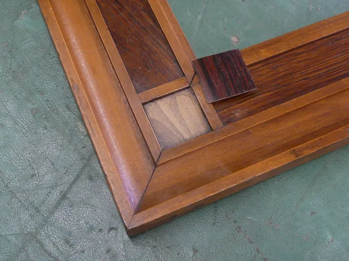Original veneer surface scuffed and ready for rosewood.