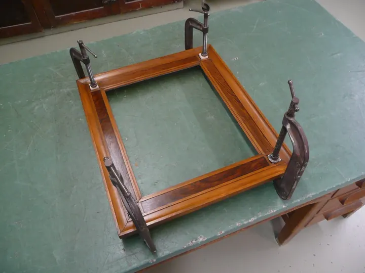 New rosewood clamped in place.