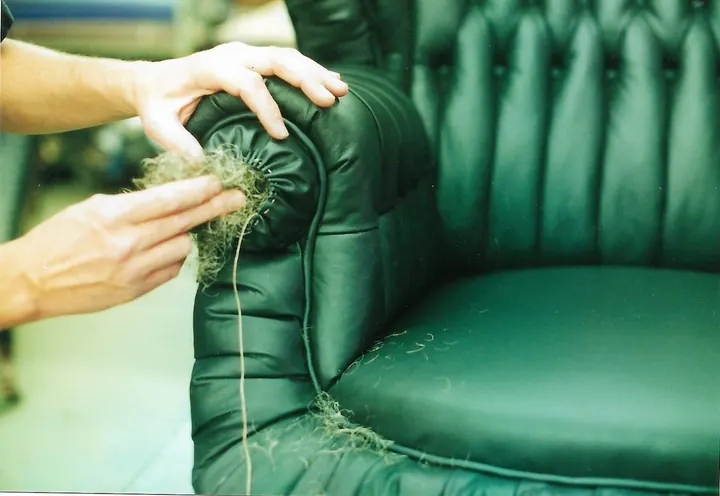 Every puff and fold is hand-stitched and hand-stuffed with horse hair.