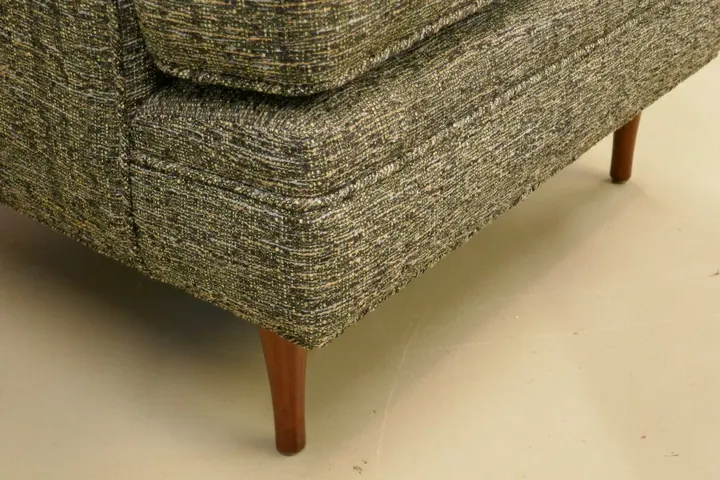 I love the fabric. Perfect application. Refinished legs are a nice touch.