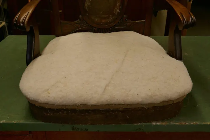 A layer of cotton batting encases the tow fiber.