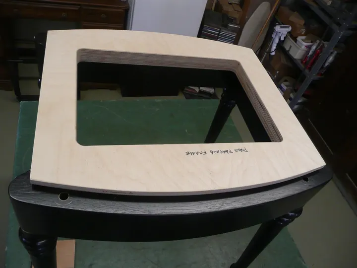This is the frame for the smaller seat and the insert holes for the director's chair posts. (a change in design shows it labeled as the playing version)