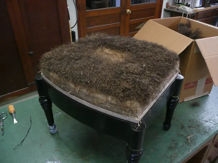 I used Spanish moss over 100 years old to further smooth the surface and create a light crown.
