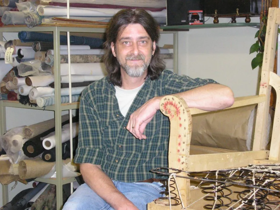 Kim Buckminster in his upholstery shop