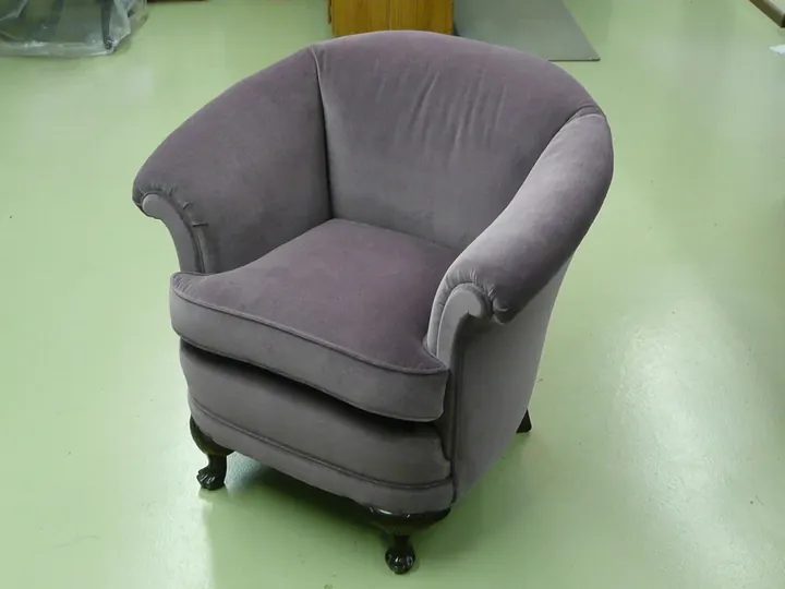 The finished cover, on a 1920s parlor chair in the shop