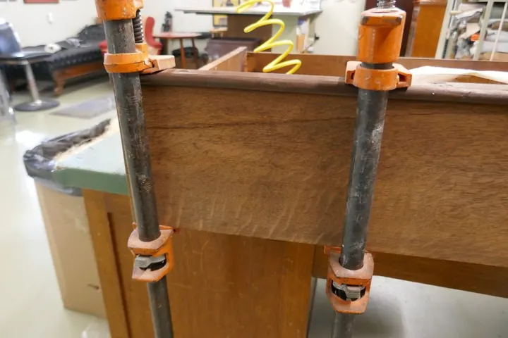 Face-frame had a shrinkage crack extending into the oak veneer.