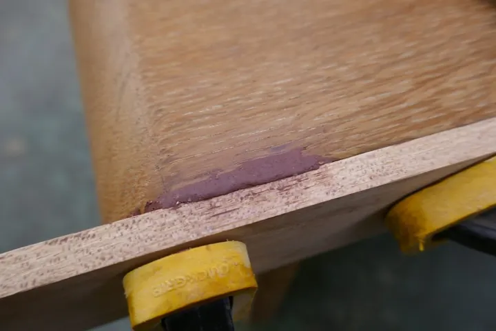 Epoxy ready for sanding. This repair vanished under the oak finish.