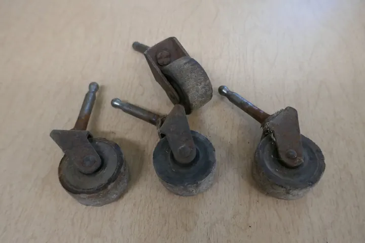 Casters prior to refinishing.