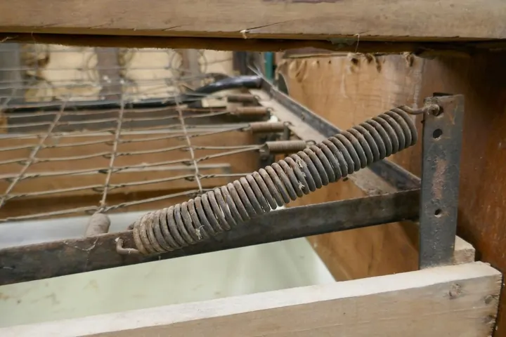 One of these two springs is missing. I'm hoping to shorten a garage door spring in replacing both to equal tension.